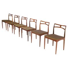 six chairs are lined up in a row