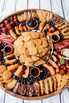 a platter filled with lots of different types of food