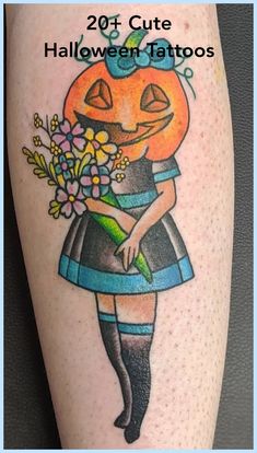 a girl with a pumpkin on her head and flowers in her hand is holding a flower bouquet