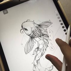 someone is drawing something with their tablet