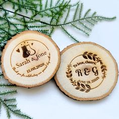 two personalized wooden coasters sitting next to each other