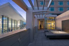 an empty courtyard in front of a large building