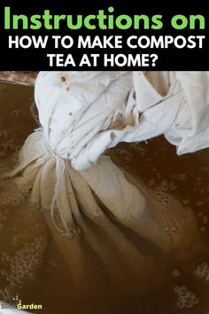 a tea bag sitting on top of a metal pan filled with water and brown liquid