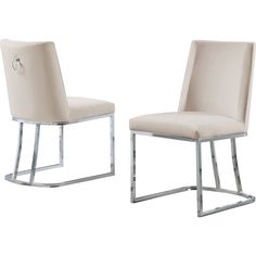 two white chairs sitting side by side