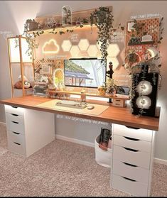 a desk with drawers and a computer monitor on it, surrounded by various items that include honeycombs