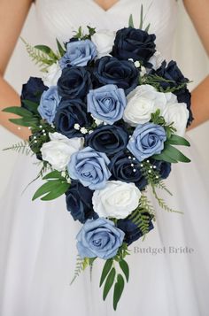 a bridal holding a bouquet of blue and white flowers