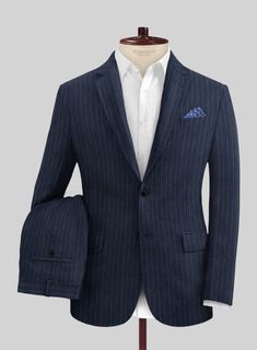 Our Loro Piana Oranio Linen Wool Suit combines traditional and modern accents, offering a distinctive approach to formal wear. This premium suit is crafted from a blend of wool, silk and linen, making a statement in contemporary fashion. The refreshing blue stripes add sophistication, elevating your summer events. 
   A marriage of elegance and comfort, Loro Piana fabrics are made using the highest quality raw materials in the world, in their purest form or blended together. A sophisticated resp Luxury Straight Leg Men's Suits, Luxury Ralph Lauren Workwear Suits, Luxury Ralph Lauren Semi-formal Suits, Loro Piana Suit Men, Classic Festive Suits With Suit Collar, Festive Cotton Formal Suits, Festive Formal Cotton Suits, Festive Cotton Suits For Formal Occasions, Fitted Cotton Formal Set