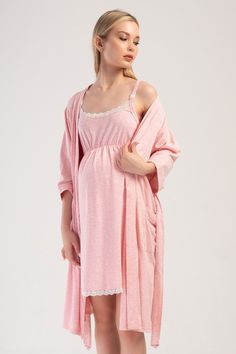 Experience ultimate comfort and elegance with our Organic Cotton Maternity Dressing Gown Set, thoughtfully designed for pregnant and postpartum women. This versatile nightgown set for pregnant women includes a soft, breathable nightgown and a matching kimono-style robe, perfect for both home and hospital use. Crafted from eco-friendly organic cotton, the set offers a gentle, skin-friendly feel, ensuring maximum comfort throughout pregnancy and beyond. The maternity kimono robe set is ideal for hospital stays, featuring an easy-access design for nursing and postpartum care. Whether you're preparing for delivery or looking for comfortable postpartum wear, this postpartum hospital gown set provides the perfect combination of style, functionality, and comfort for new and expecting moms. Key Fe Nursing Friendly Fitted Maternity Dress For Loungewear, Fitted Nursing Friendly Maternity Dress For Loungewear, Summer Maternity Loungewear Dress Nursing Friendly, Spring Maternity Nursing Friendly Sleepwear, Pink Maternity Dress, Nightgown Sets, Mode Kimono, Hospital Gown, Pregnancy Wardrobe