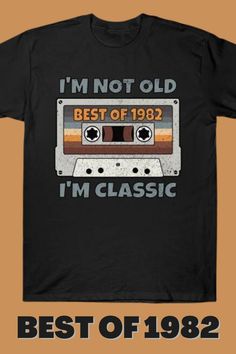 Vintage Retro Big Cassette Tape BEST OF 1982 Vintage Classic Music T-Shirt - birthday present for men and women who are born in 1982. Classic vintage 1982 retro bday gift for mom, dad, husband or wife. Featuring retro cassette tape printed onto the front. Great, cool, original Music Cassette Tape Design for men and women. Vintage original Gift for your family or friends. Awesome present for dad, father, brother, sister, husband, boyfriend, uncle, girlfriend,  mother, wife, aunt, colleague. 1982 Birthday