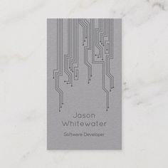 the business card is designed to look like an electronic circuit board with wires on it