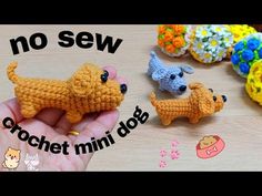 crochet miniature dogs are being displayed in front of a wooden table with the words no sew on it