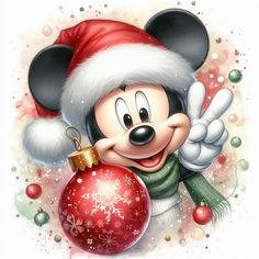 a mickey mouse with a christmas ornament hanging from it's ear and wearing a santa hat