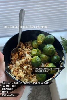 a bowl filled with rice and brussel sprouts