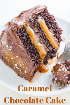 a piece of chocolate cake with caramel icing on a plate next to a fork