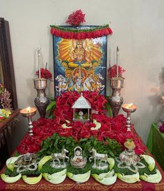 the altar is decorated with flowers, candles and other items to celebrate it's occasion