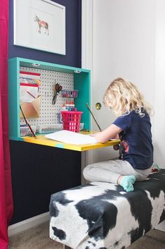 This DIY wall mounted desk can be built in a couple hours. This drop down desk also has hidden storage for office or art supplies! Great for kids or adults! #diyideas #diy #diydesk #dropdowndesk #officeideas #kids Diy Wall Mounted Desk, Diy Kids Desk, Storage For Office, Kids Room Desk, Drop Down Desk, Mounted Desk, Fold Down Desk, Desk Plans, Diy Wand