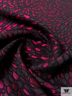 an image of a pink and black fabric