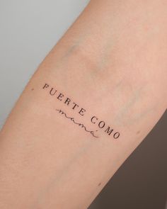 a woman's arm with the word fuerte commo written on it