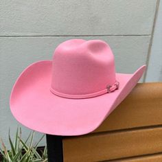 Serratelli Hat Company Made in the USA Brim: 4.25 inches Long Oval Color: Pink 2X Wool Satin Lined Leather Sweatband Fitted Brimmed Hat For Rodeo, Fitted Wide Brim Hats For Rodeo, Western Wide Brim Fitted Hats, Fitted Wide Brim Western Hats, Western Pink Hat With Curved Brim, Western Hat With Curved Brim, Western Hat With Flat Brim, Western Style Pink Hat With Curved Brim, Fitted Solid Color Hat Bands For Rodeo