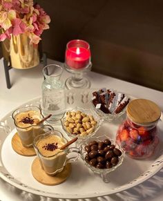 desserts and candies are arranged on a tray