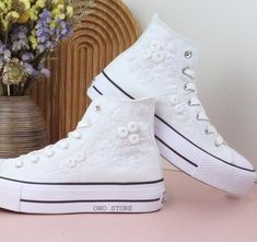 Custom Wedding Converse/ White Flowers Embroidered Sneakers for Bride/ Embroidered Wedding Reception Shoes/ Wedding gift shoes/ gift for her  💸 Price includes Converse Shoes and floral embroidery as shown 🌸 You can send me your Converse/Vans shoes or I can buy them for you. We stock all the Converse and Vans shoes you want, if you want other Converse/Vans shoes in the store, please message us. Your embroidered Converse/Vans shoes will be available for shipping in 7-15 days. 🌸 I started hand embroidering on fashionable clothes and handbags over 20 years ago - and now on CONVERSE/VANS shoes, an American icon, a must-see classic! I'm excited to give your Chuck Taylor shoes a new look with beautiful, nature-inspired embroidery. All images, designs and text used by CUSTOMSHOEDESIGNSOHO are c Diy Wedding Converse, Wedding Low-top Sneakers With Floral Embroidery, White Lace-up Sneakers With Appliques, White High-top Sneakers With Floral Embroidery, White Embroidered Lace-up Sneakers, Converse With Wedding Dress, Converse Platform White, Wedding Reception Shoes, Sneakers For Bride