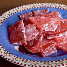 pieces of raw meat on a blue and white plate