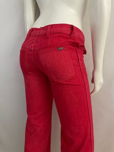 "Vintage Women's 70's Red, Low Rise, Bell Bottom, Jeans by Cheap Jeans (S) 1378 These Ladies jeans come in red colored denim and are low waisted, with two front pockets with two back pockets with a bell bottom leg shape. The denim is soft like a pant and does not stretch. Cotton/Polyester Blend *These pants are slightly too small for the mannequin and the zipper works properly. *If shipped within the US, this will go Priority Mail for a quick delivery! Size: (S) Modern Day 2 Waist: 28\" Hips: 32 Retro Red Wide Leg Jeans, Retro Red Jeans For Spring, Retro Red Spring Jeans, Retro High Waist Red Jeans, Retro Fitted Red Jeans, Retro Red Cotton Jeans, Retro Red Bottoms For Spring, Retro Red Cotton Bottoms, Vintage Red Wide Leg Jeans