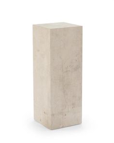 a concrete block is shown against a white background with no people in the photo to describe it