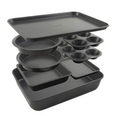 an assortment of black plastic dishes and trays