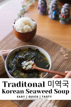 a bowl of korean seaweed soup on a table with rice and chopsticks