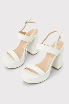 Let your shoes be the star of the show when you wear the Lulus Acee White Platform Heels! These ultra-chic heels are shaped from smooth faux leather and feature a slender toe band and matching quarter strap, secured with a shiny silver buckle. 1.5"" toe platform. 5" wrapped block heel. Cushioned insole. Rubber sole has nonskid markings. Man Made Materials. Imported. Lulus | Acee White Platform Heels. Platform Heels Short, White Heels Comfortable, White Graduation Shoes, Plain White Heels, White Thick Heels, Wedding Shoes Heels White, White Chunky Heels, Hoco Heels, Grad Shoes