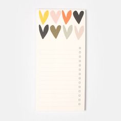 a notepad with hearts on it