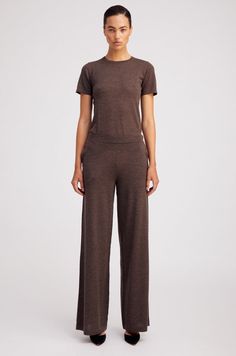 SPRWMN - $795.00 | These fine-knit lightweight cashmere pants are a lounge favorite. This wide-leg silhouette features a high-rise elastic waistband that naturally cinches your waistline for a flattering fit you can wear all day long. Made in our high-quality, ultrasoft Mongolian yarn, you'll fall in love with these pants, as their elegant drape makes them look like a dress pant, but they feel like a sweatpant. Pair them with our matching cashmere tees or sweaters for the perfect elevated lounge look. #ad Knit Sweater With Leather Pants, Quality Cashmere Sweaters, Sprwmn Leather Pants, Sweater Leather Pants, Ladylike Dress, Lounge Looks, Cashmere Pants, Heather Brown, Luxe Style