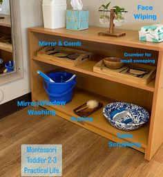 a wooden shelf with various items labeled on it