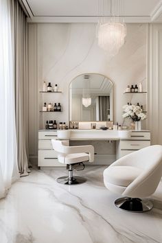 a white chair sitting in front of a mirror on top of a counter next to a vanity