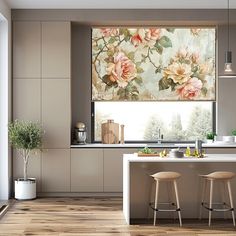 a kitchen with two stools and a painting on the wall