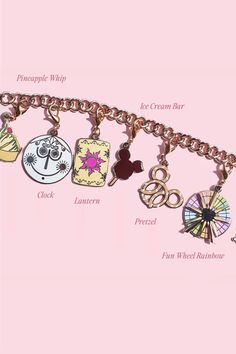 a pink background with many different charms on the link to an ident charm bracelet