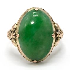 This lovely ring--probably made in the 1920s--is made of gold fill and is replete with elegantly simple Arts & Crafts design elements. The central stone is an oval piece of beautifully verdant nephrite jade. Metal: Gold Fill Main Stone: 1 Oval Cut Cabochon Jade (16.11 x 11.36 mm) Ring Size: 6.0 (can be sized) Simple Arts, Easy Arts And Crafts, Art And Craft Design, Nephrite Jade, Jade Ring, Lovely Ring, Simple Art, Design Element, Oval Cut