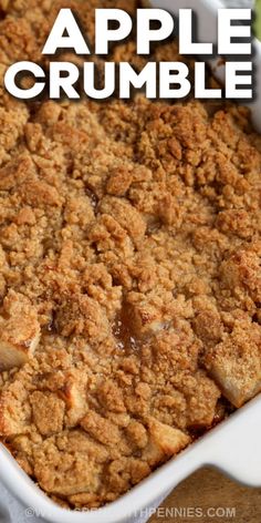 an apple crumble in a white casserole dish with the words apples crumble above it