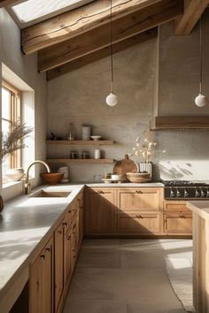 a large kitchen with wooden cabinets and white counter tops, along with an open skylight