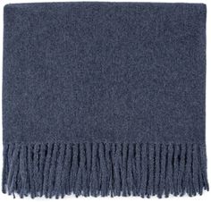 a dark blue blanket with fringes on it