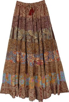 A beautiful multi-panel long skirt with a good fall and floral brown prints. The skirt has an elastic waist with a tassel drawstring. #tlb #Patchwork #MaxiSkirt #Printed #TieredSkirt #Summerskirt Fall Bohemian Brown Skirt, Bohemian Brown Skirt For Fall, Brown Patchwork Skirt For Fall, Fall Patchwork Brown Skirt, Brown Long Skirt For Festival, Traditional Long Brown Skirt, Festival Long Brown Skirt, Spring Brown Patchwork Skirt, Brown Patchwork Tiered Skirt