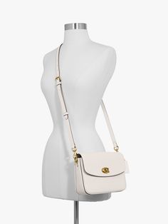 More compact than the original, the Cassie 19 cross body bag from Coach is ideal for nights and days on the go. Made from polished pebble leather, its finished with a signature turn-lock closure and three interchangeable straps for versatile styling. Detach the crossbody strap and carry by hand with the leather and chain top handles together or separately. The bag is completed with a hanging leather tab and Coach branding. Coach Branding, Cross Body Bag Black, Body Coach, Leather Cross Body Bag, Buy Bags