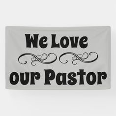 we love our pastor banner on a white wall with the words, we love our pastor