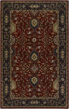 a red and blue rug with an ornate design