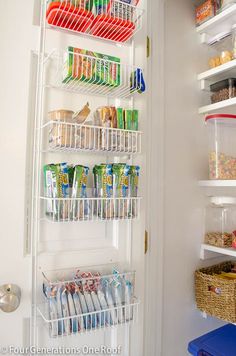 an organized pantry with white shelves and baskets on the bottom shelf, filled with food