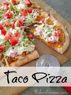 a pizza sitting on top of a wooden cutting board