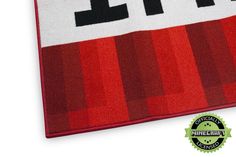 a red and white rug with the word minecraft on it's front corner