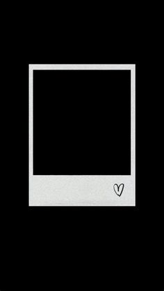 a white frame with a black heart on it