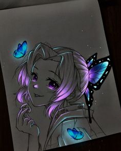 a drawing of a girl with butterfly wings on her head, next to a cell phone